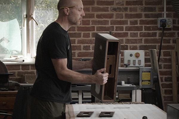 Craftsman working on R5 MiE cabinet